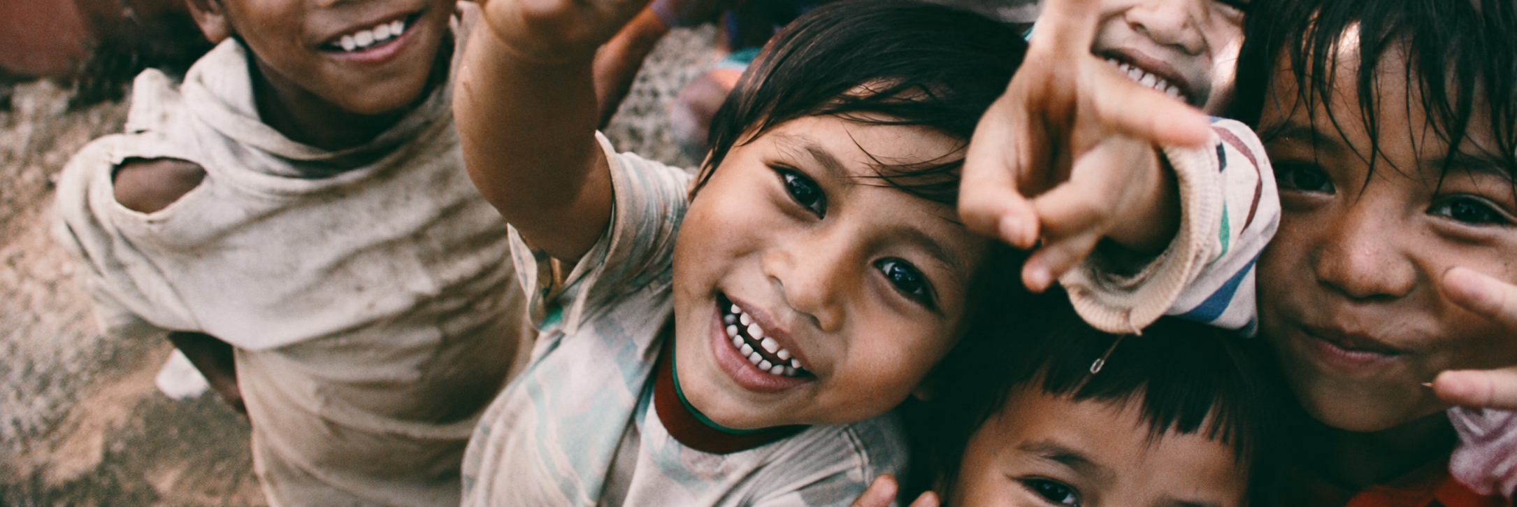 Happy children and NGO volunteers