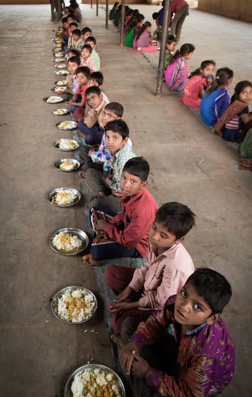 Children receiving food support from SevaRoots Foundation